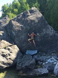 Tyler Janzen bouldering, photo: Anne Tong